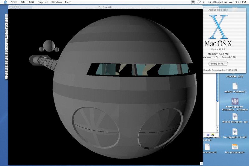 A Mac OS X 10.2 desktop with a FreeWRL window showing the grey space station and an About This Mac box.